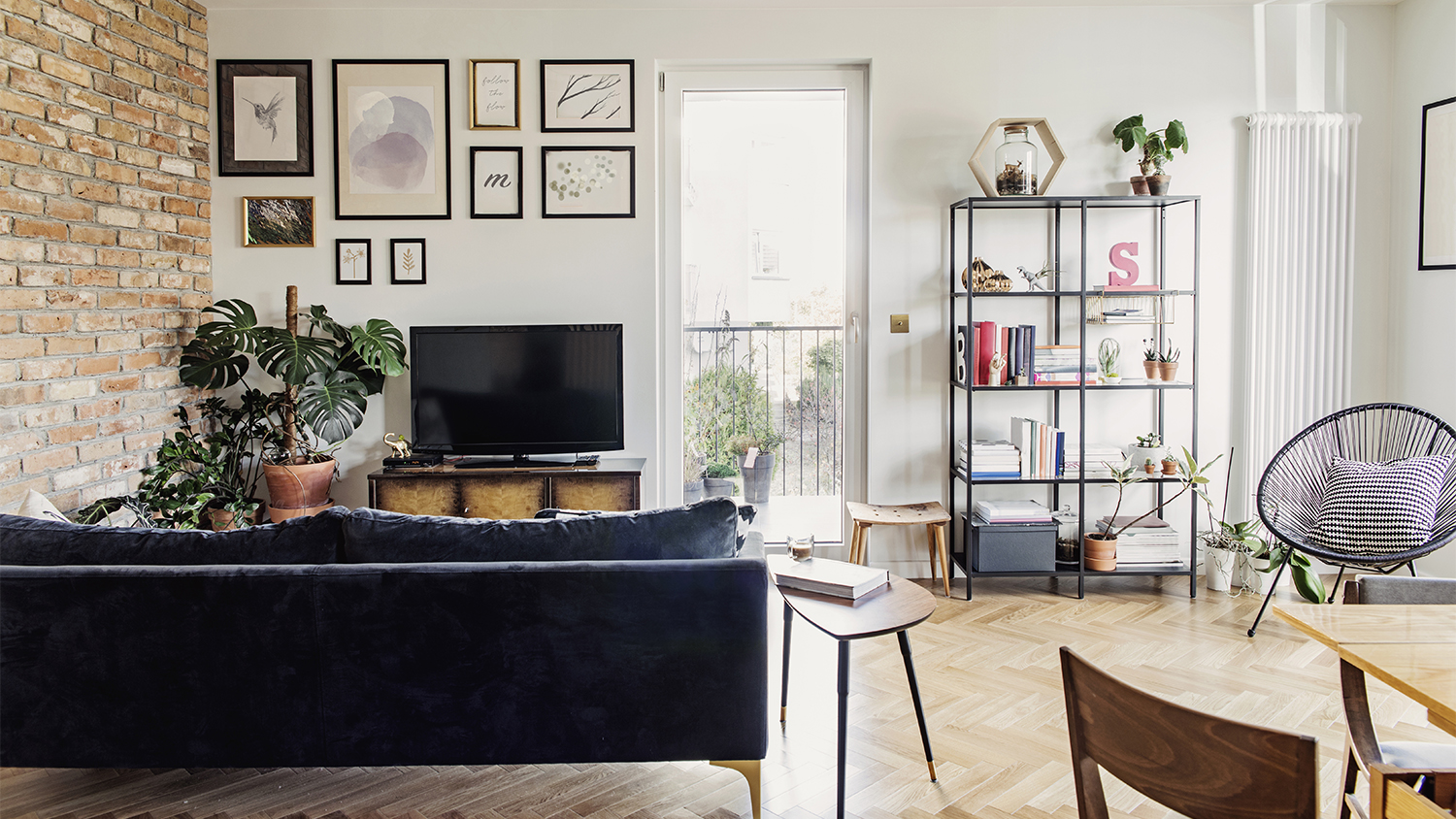 living room with gallery wall and tv